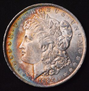 FABULOUS CRESCENT RAINBOW TONED 1884 SILVER MORGAN DOLLAR!